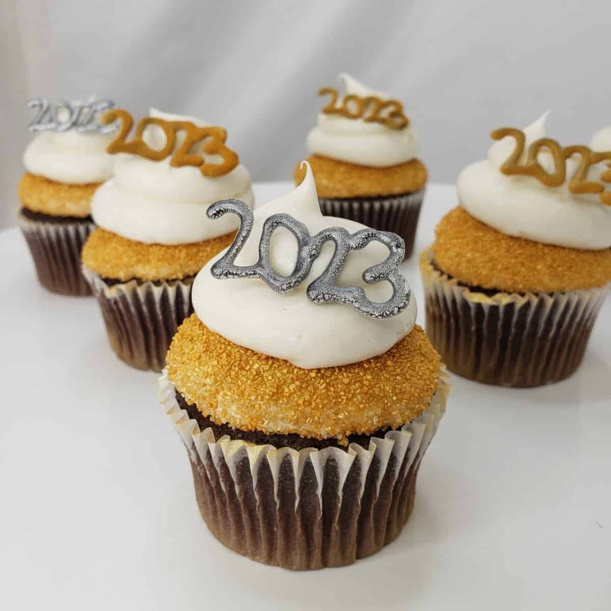 Chocolate 2023 graduation cupcakes in cu or csu gold