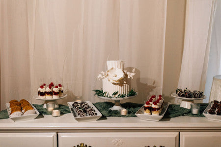 Dessert bar with cutting cake