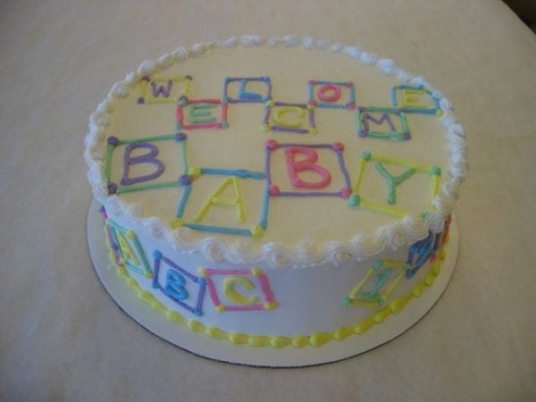 Baby Shower Cake With Buttercream Blocks piped on top and around the cake