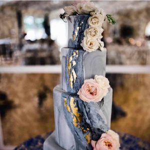 marble wedding cake with gold leaf in Colorado