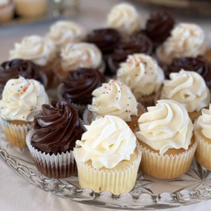 cupcakes with white and chocolate frosting